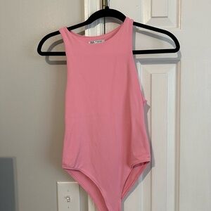 Pink body suit